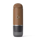 Brown and black cylindrical device on a white background