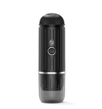 Black portable coffee maker on a white background