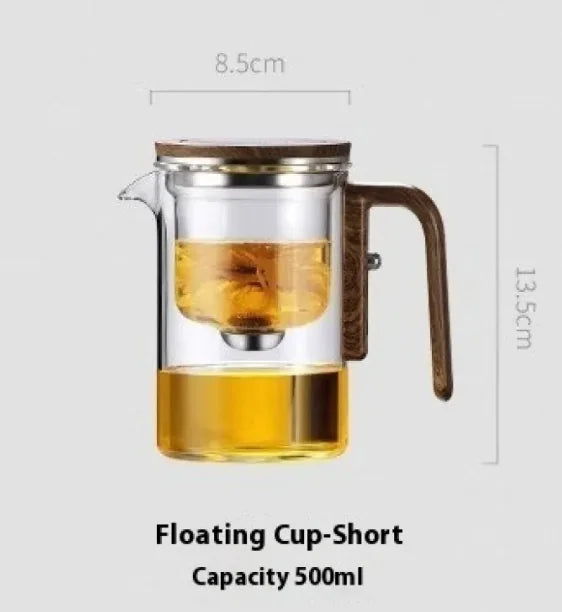 Glass teapot with wooden handle and lid, filled with tea, on a white background with measurements.
